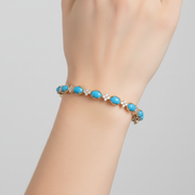 CB97337TQ6X4. 18K Solid Yellow Gold Turquoise and Diamond Fancy Bangle